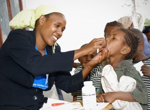 - Nutrition International A child in Ethiopia taking a vitamin A