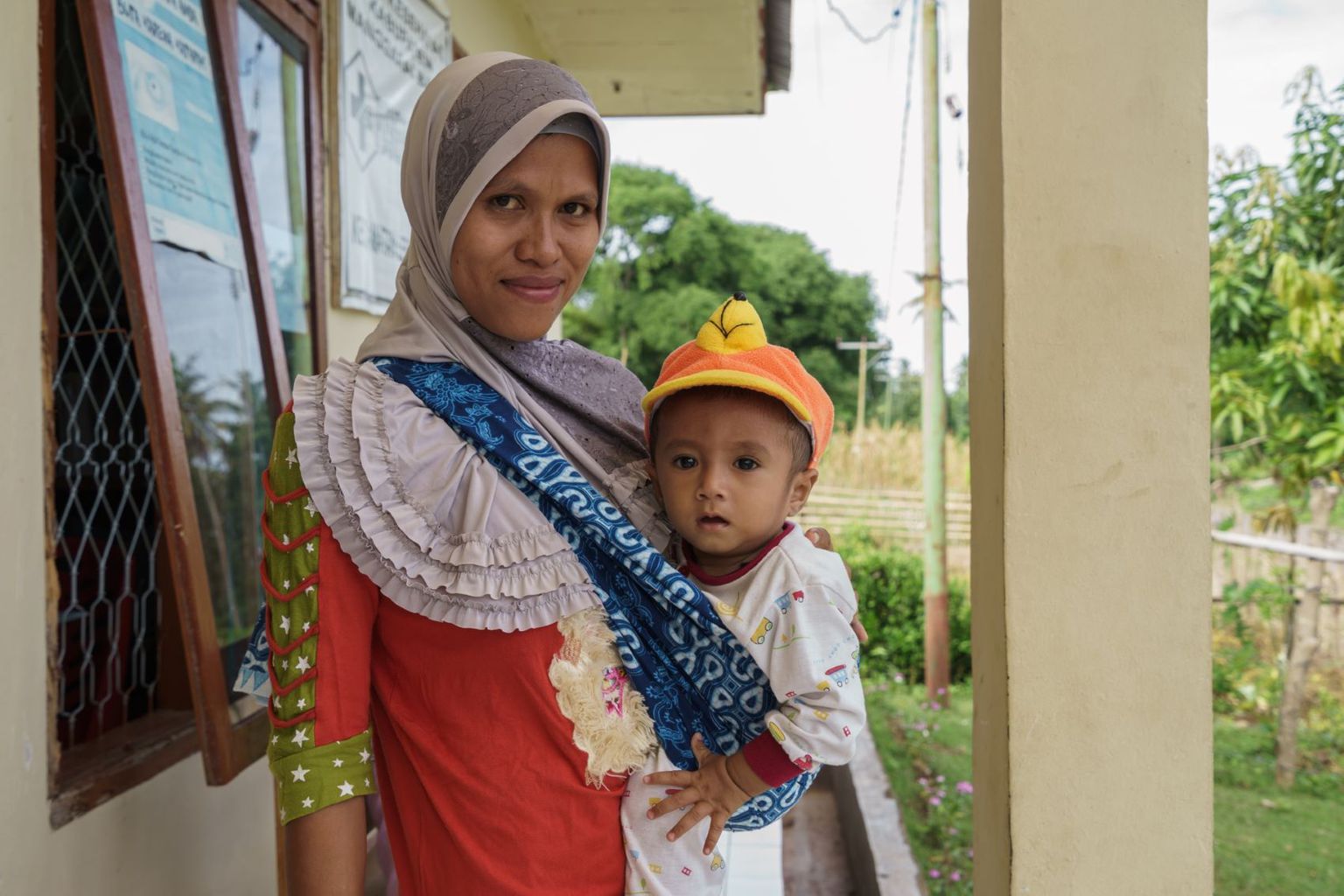 mother-carrying-baby-indonesia-1700 - Nutrition International