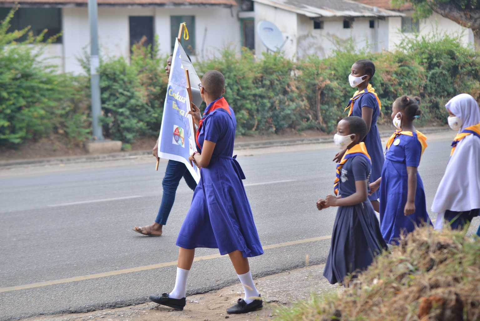 DSC_1110 - Nutrition International Girls marching in an awareness walk in Tanzania to raise awareness around adolescent nutrition.